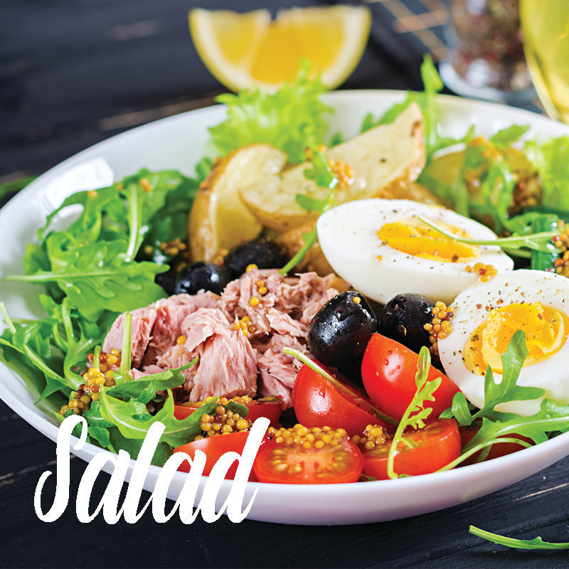 Authentic Italian salad from Italian Bites Factory with mixed greens and fresh ingredients.