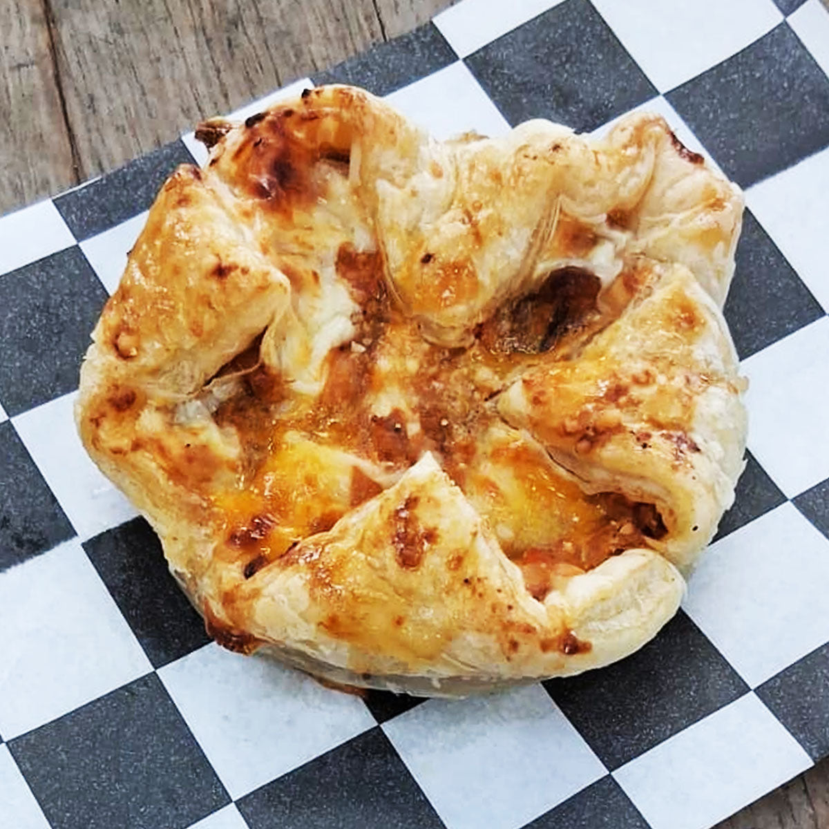 Crispy puff pastry shells cradle layers of tender fried eggplant, tomato sauce, and creamy mozzarella in these elegant Italian appetizers