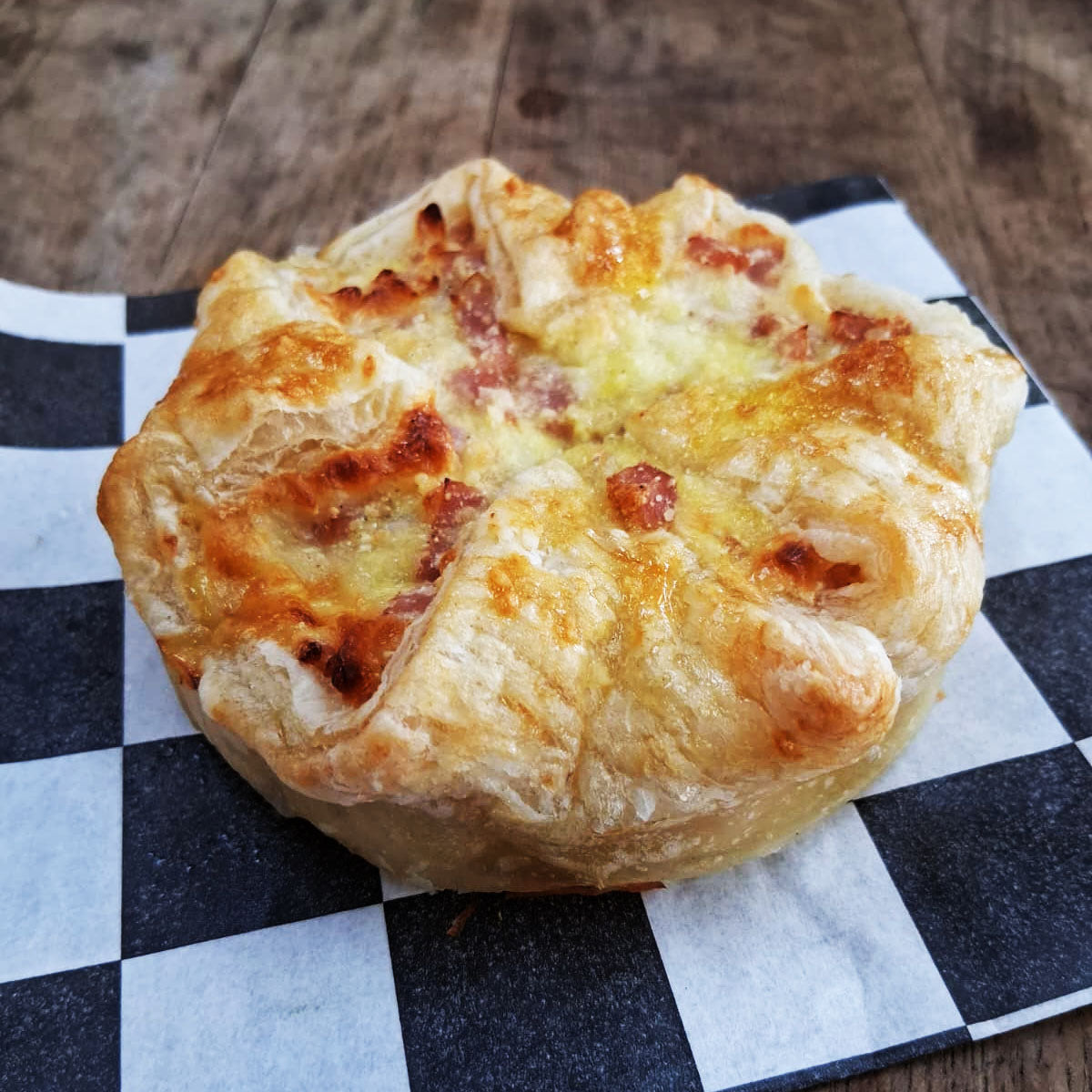 Buttery puff pastry forms the foundation for these refined Italian appetizers, topped with premium Italian ham and melted mozzarella, then brushed with egg for a burnished golden finish.