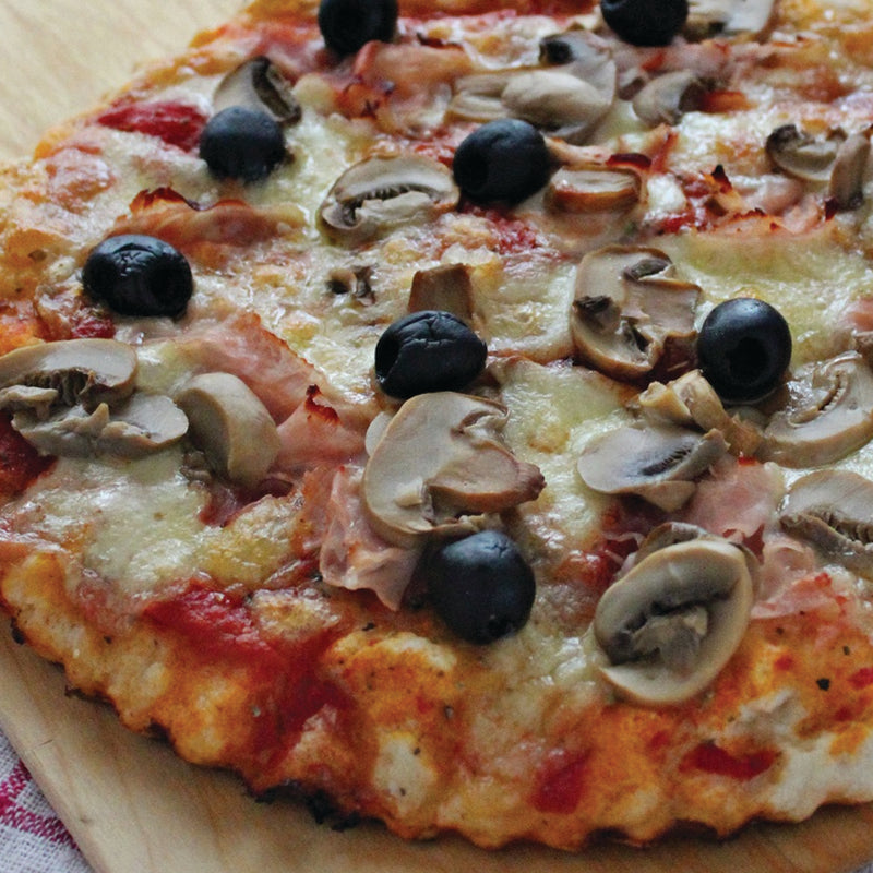 Italian Catering Capricciosa focaccia  with mushrooms and olives, ham on a wooden board