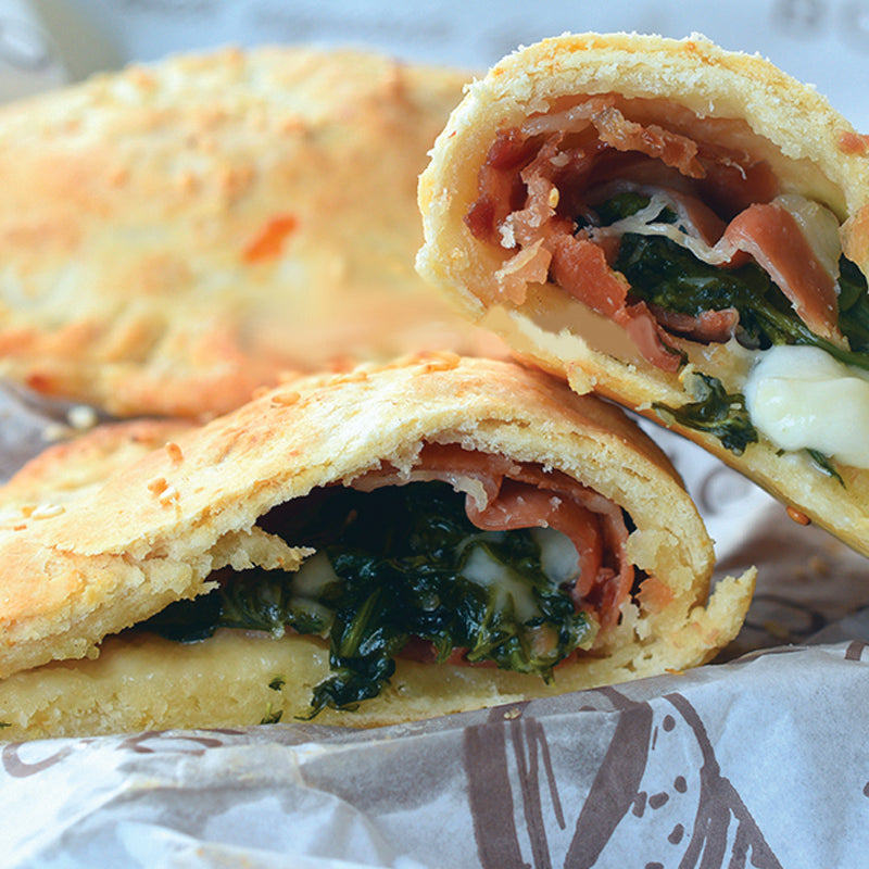 Italian Catering seafood panzerotto, smked salmon, arugula and fontina cheese